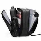 Voyager Expandable Backpack 26L / 38L with Built-in Rain Coat