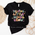 Helping Little Minds Grow Graphic T-Shirt