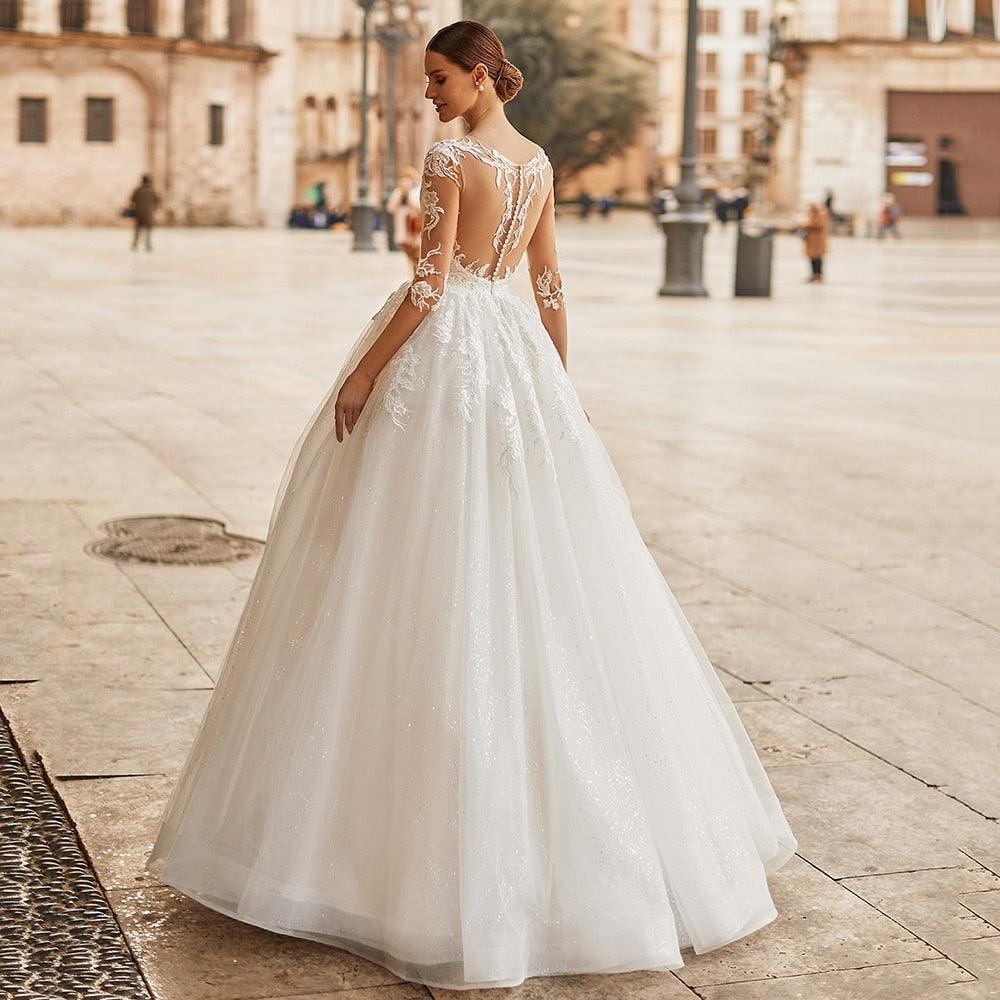 Elegant Ivory A-Line Wedding Dress with Illusion Scoop Neck, Lace Appliqués & Half Sleeves